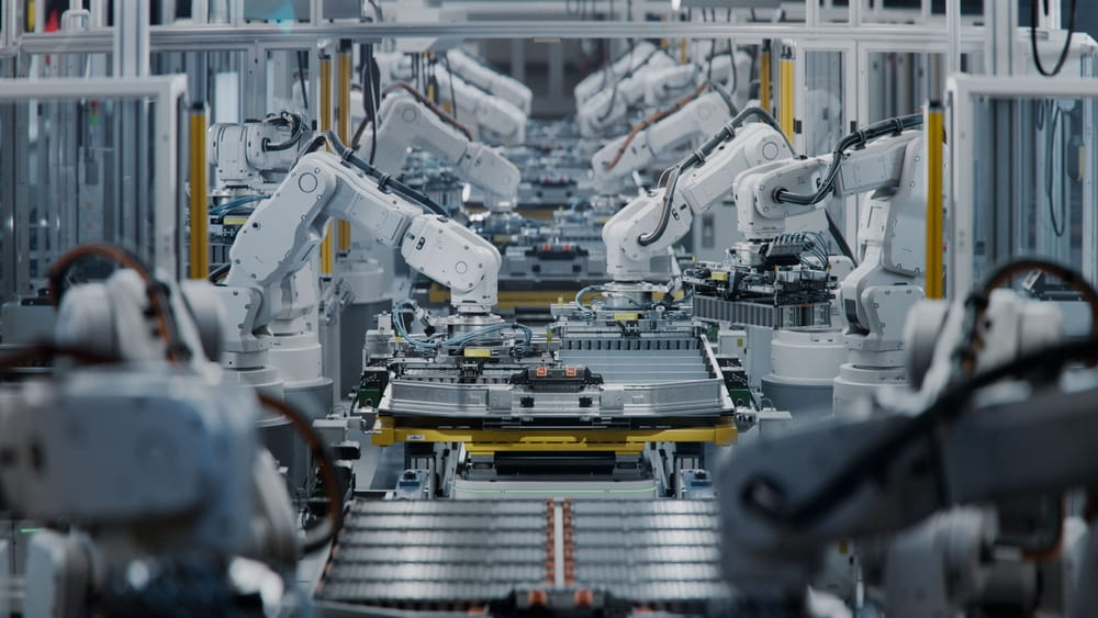 Industrial Robot Arms Assemble Lithium-Ion EV Batteries